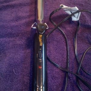 Heat Master Curling iron. 1"